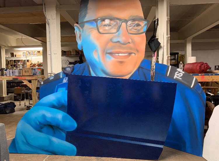 Photo of a TSA Agent depicted by Evan Lovett