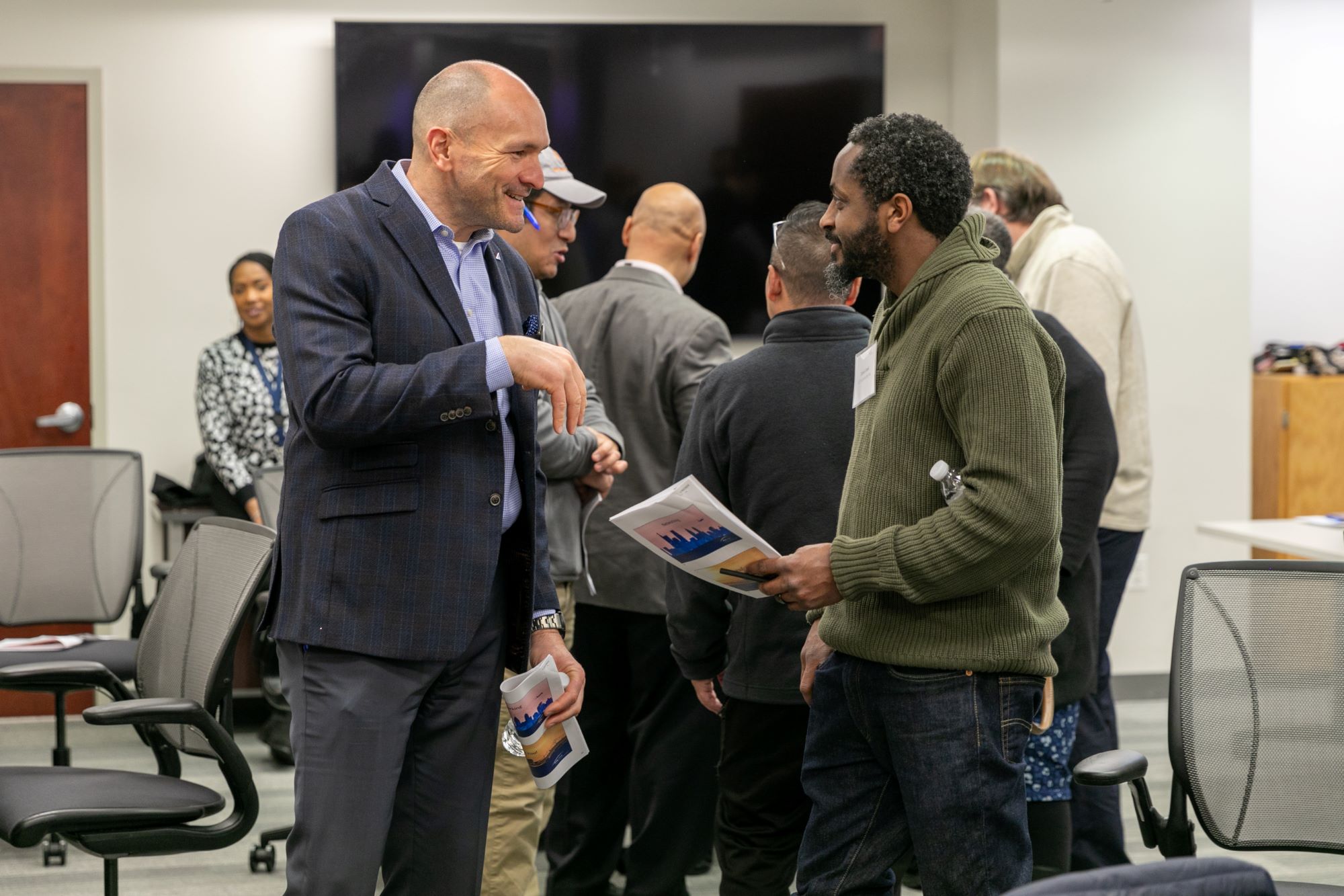 Airport construction workshop attendees networking