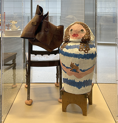 sculpture of a large doll figurine