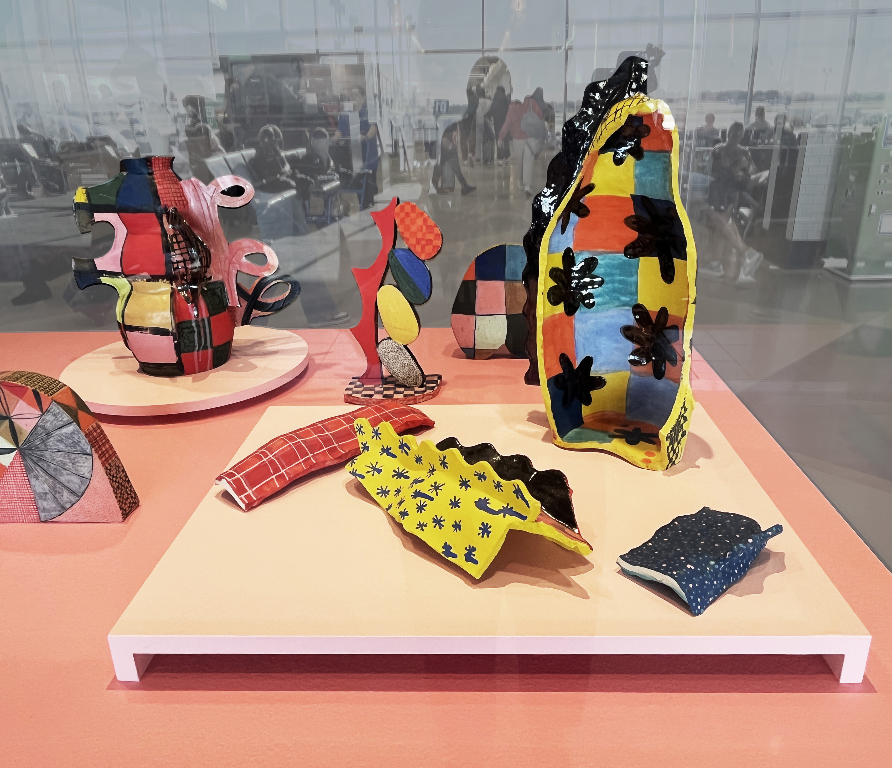 brightly painted and patterned ceramic vessels