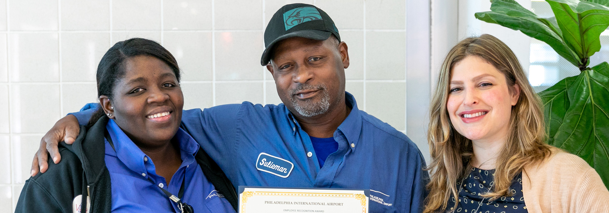 sulieman holding certificate