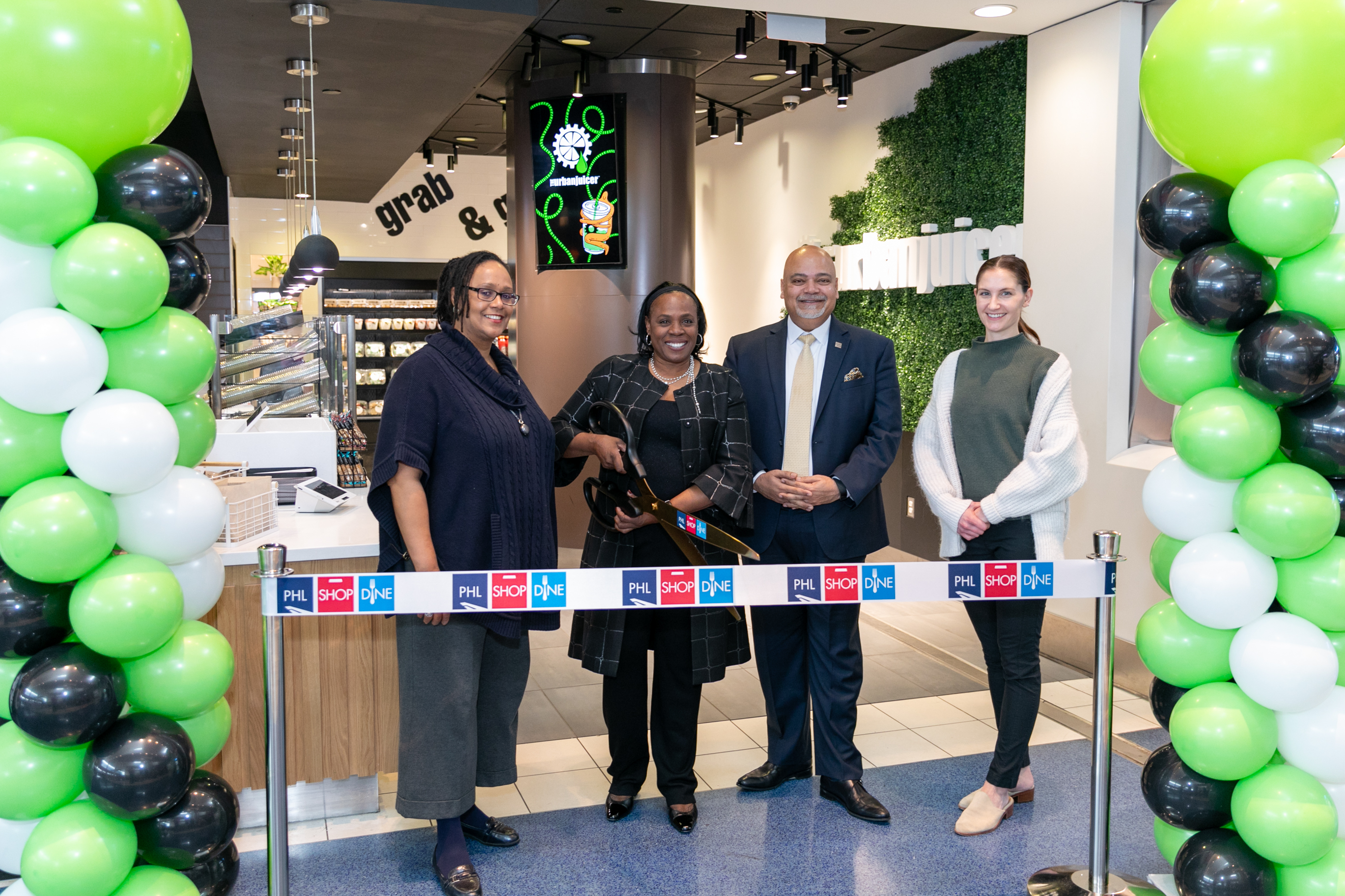 From left: Emily Nichols, Assistant General Manager, MarketPlace PHL, Sandra Long, SLA Worldwide founder and CEO; Atif Saeed, PHL CEO; and Ashley Vesay, Leasing Manager, MarketPlace PHL
