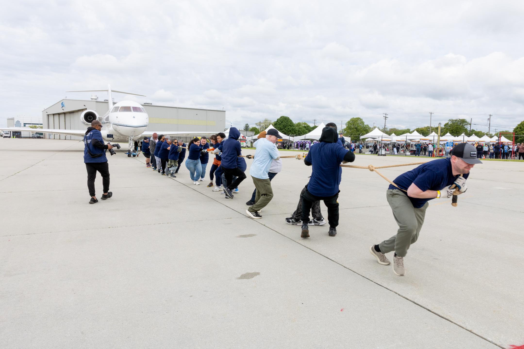 PHL Employees Pulling Plane