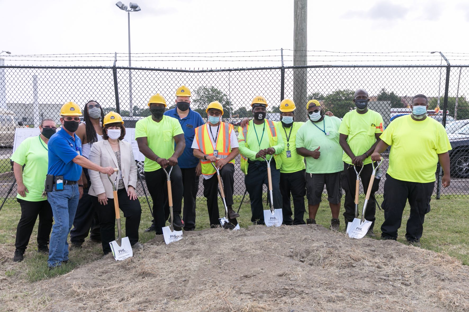 P&G crew with shovels and hard hats