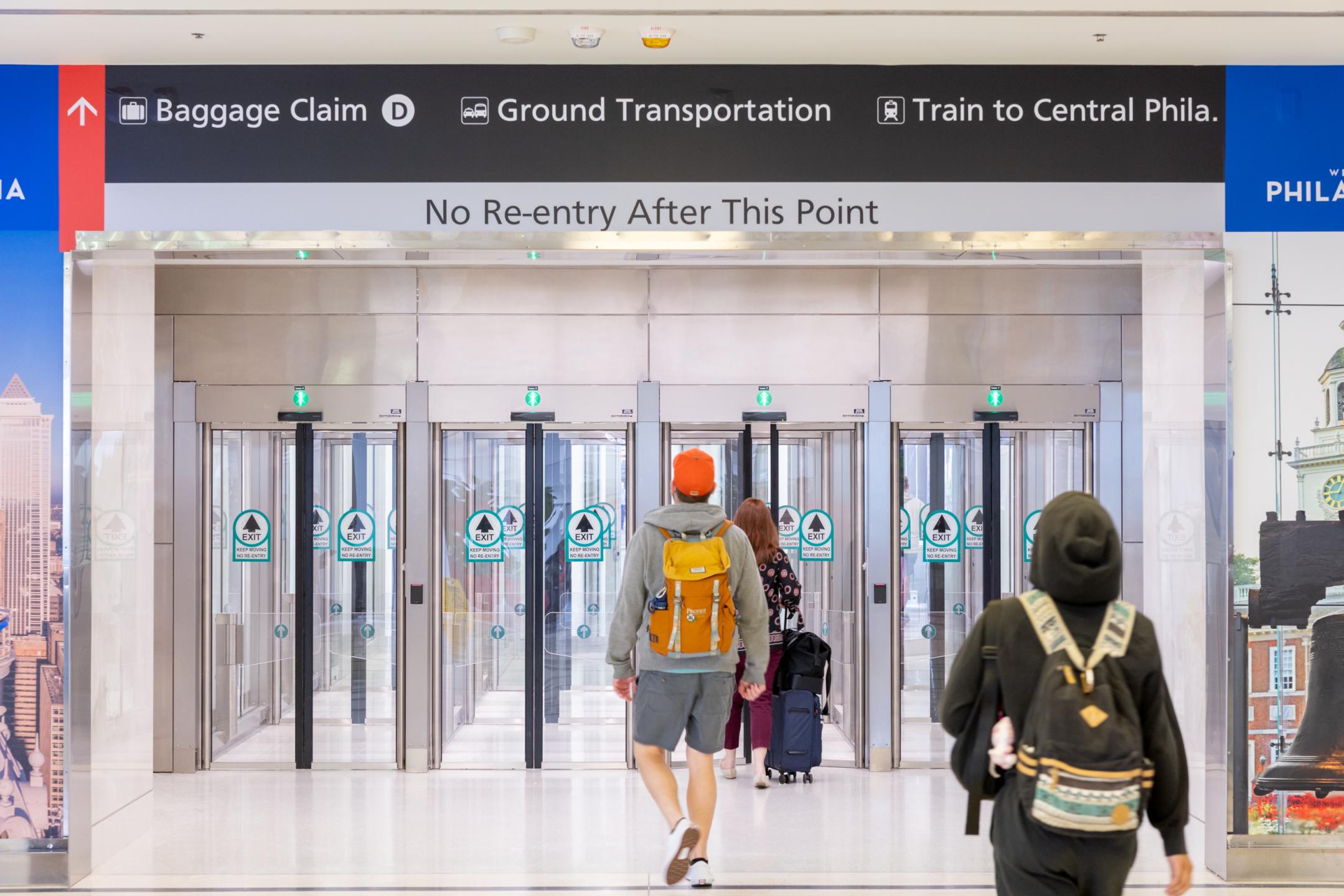 Passengers exiting Terminal D