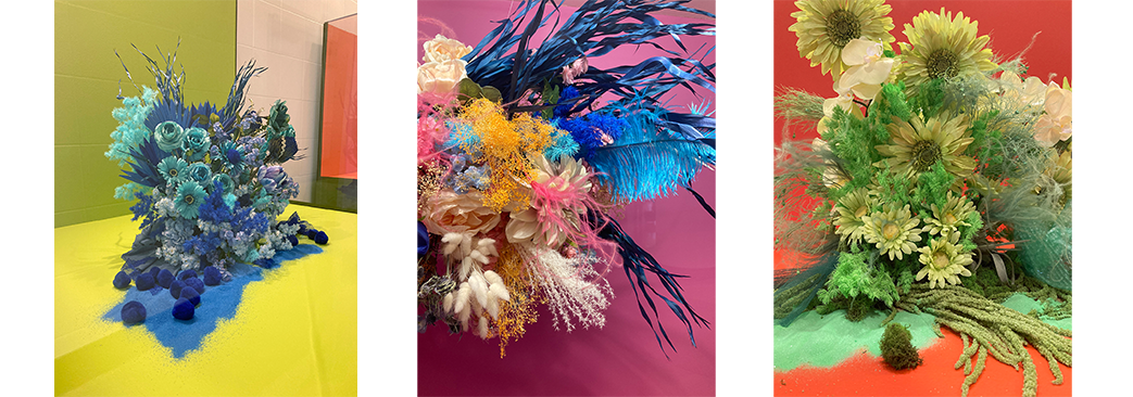 3 colorful botanical creations with bright backgrounds in a class boxes