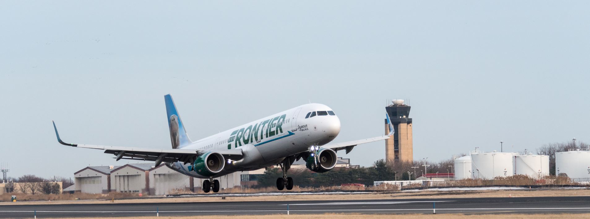 Frontier plane taking off