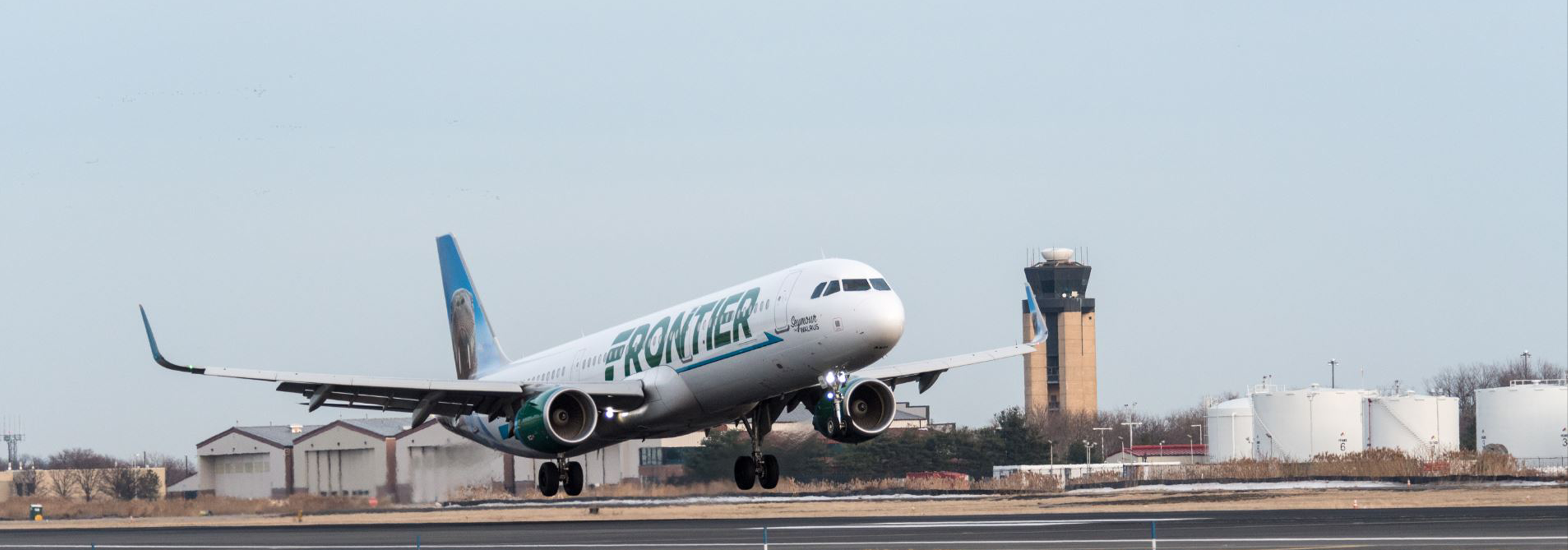Frontier plane taking off