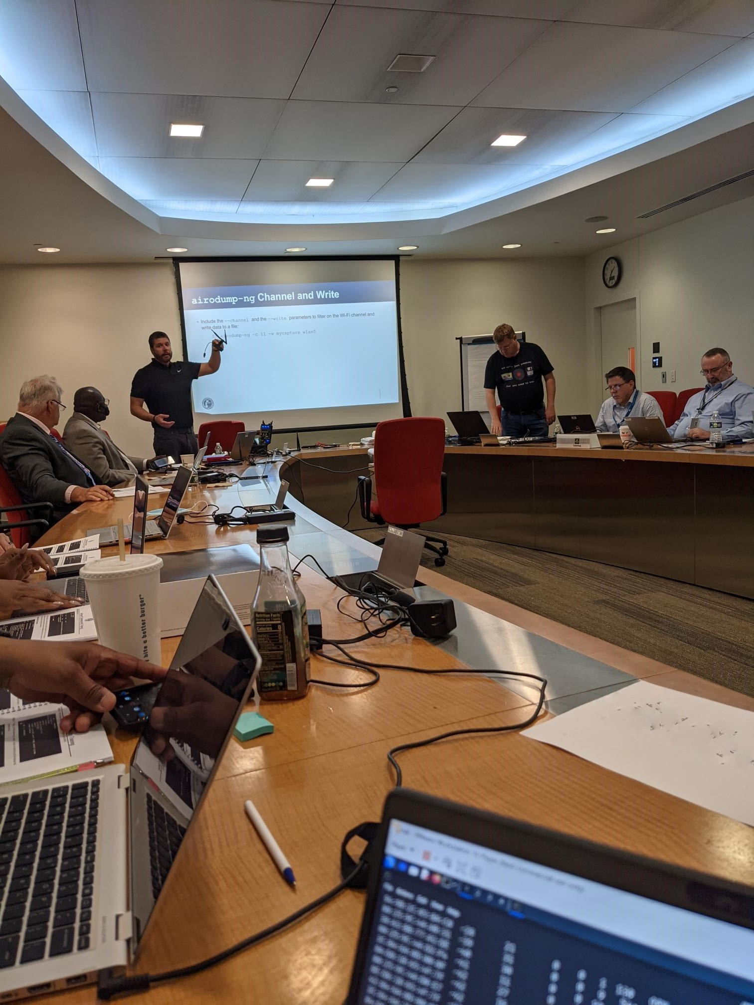 cybersecurity training course. People in conference room