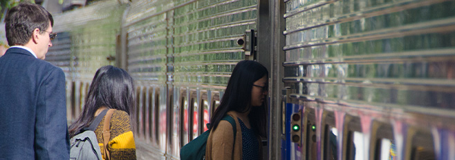 passengers boarding train