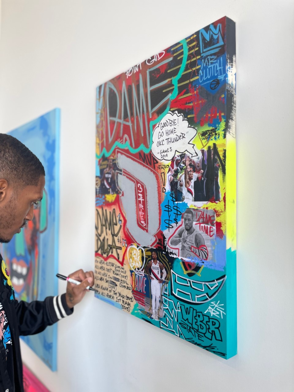 photo of artist with work 