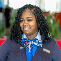Woman in uniform smiling