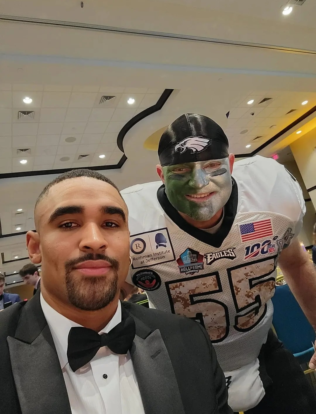 Young dressed as his alter ego Ultimate EaglezPhan with Eagles Quarterback Jalen Hurts.