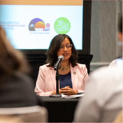 woman sitting at panel