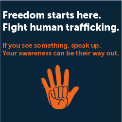 Dark blue background, white writing. Freedom starts here. Fight human trafficking. Orange hand with palm facing out, then closed hand with thumb tucked.
