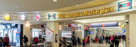 marketplace shops in B/C with passengers walking