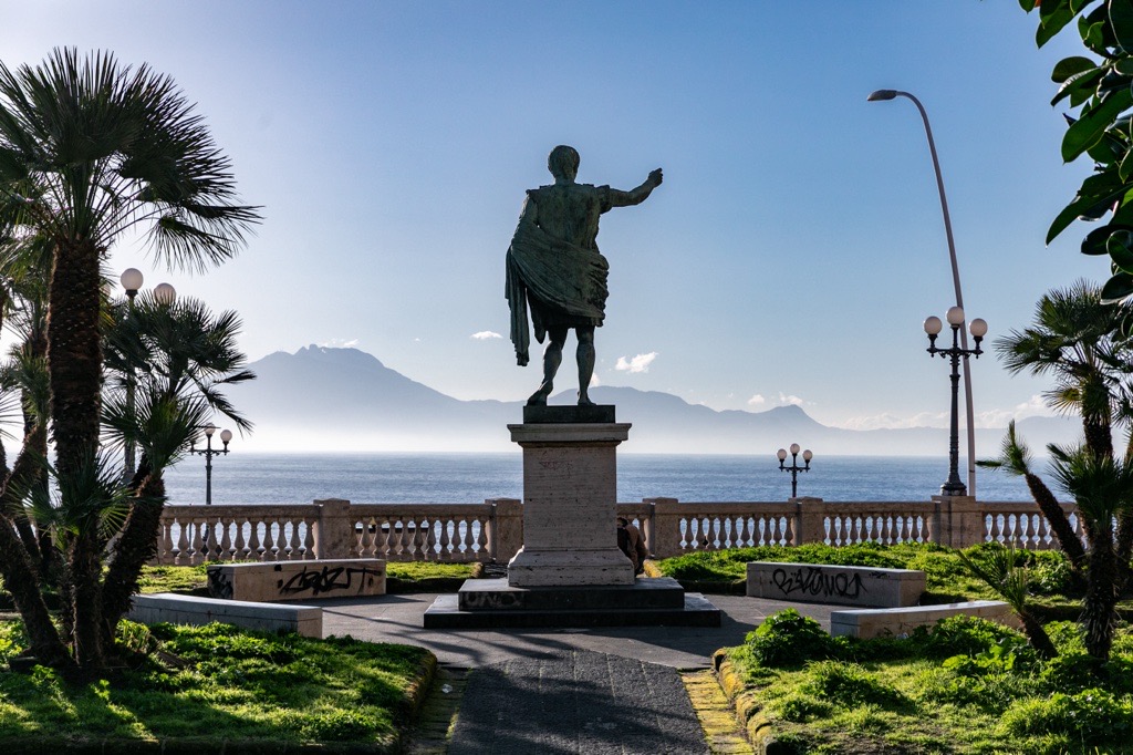 Statue near water in Naples