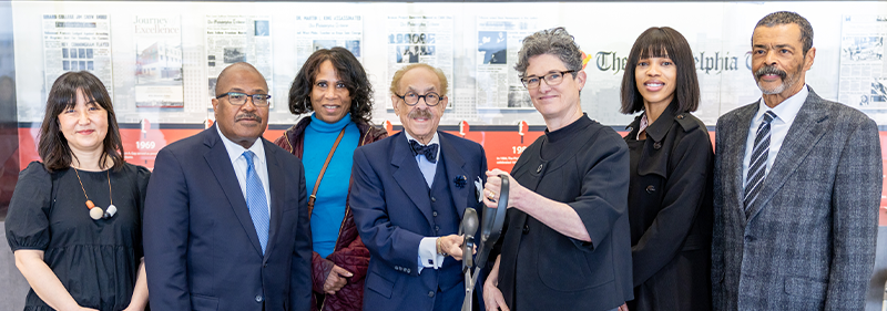 Tribune exhibit ribbon cutting