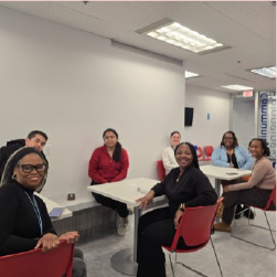 YoPros sitting a a table